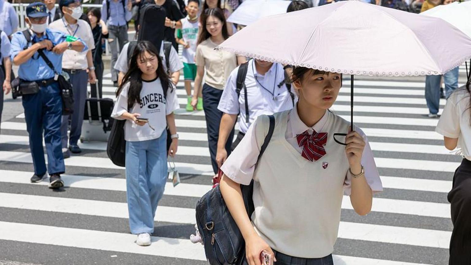 Japan temperatures soar over 40C, marking first 'cruelly hot day'